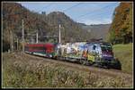 1116 157 mit Railjet zwischen Bruck/Mur und Pernegg am 23.10.2019.