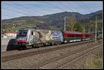 1216 019 mit Railjet bei Bruck an der Mur am 18.10.2019.