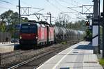 Vectron 1293 045 in Traktion mit der 1144 111 der ÖBB mit einem Kesselzug am 20.09.2023 in Lanzendorf-Rannersdorf Richtung Wien Kledering.