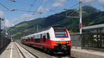 cityjet 4746 039 als REX 1504 Salzburg - Wörgl; rechts im Hintergrund die Hohe Salve (1828m); Brixen im Thale, 22.06.2018
