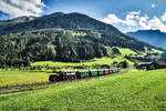 73.019 fährt mit dem Sdz 901 (Krimml - Zell am See), kurz vor dem Bahnhof Neukirchen am Großvenediger vorüber.