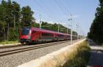 Railjet 653 verstrkt durch 2 Schleuderwagen am Zugende fhrt von Wien Meidling nach Graz.