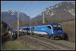 1216 233 mit Railjet bei Payerbach am 4.12.2019.