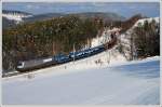 Frhlingsbeginn am Semmering, und das gleich mit 1116 038  Siemens  mit ihrem 46750, aufgenommen bei der Talfahrt der Semmering Nordrampe kurz vor der Durchfahrt durch den Steinbauer Tunnel am