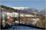 Hackschnitzelzug mit 1144 und 1116 am Abfaltersbachgrabenviadukt auf der Semmeringbahn, 21.2.2012