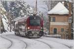 1116 238 schiebt railjet 653 (Wien Meidling - Graz) ber den winterlichen Semmering.