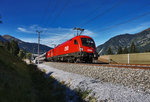 1116 092-8 und 1116 149-6 durchfahren mit einem Autozug in Richtung Villach, den ehemaligen Bahnhof Angertal.