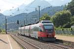 Nachschuss auf ÖBB 4024 026-9  S Bahn Vorarlberg , bei der Durchfahrt als REX (Kuftsein - Brenner/Brennero) durch den Bahnhof von Fritzens-Wattens gen Innsbruck.