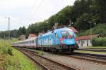 Die wohl lngst dienendste Werbelok der BB, 1016 023, bei der Durchfahrt mit dem OIC 690 von Wien Westbahnhof bis Salzburg Hauptbahnhof, hier bei der Durchfahrt des Bahnhof Hallwang-Elixhausen; am