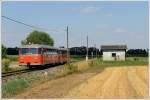 VT 10.02 + VB 10.12 bei der Rckfahrt von Bad Radkersburg nach Graz als R 19682 beim der aufgelassenen Haltestelle Weixelbaum am 11.7.2010 anlsslich einer Sonderfahrt  125 Jahre Radkersburger Bahn 