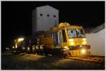 Linsinger Schienenfrszug SF03-FFS der PORR-ALPINE AUSTRIARAIL GmbH in der Nacht des 24.9.2011 auf der GKB unterwegs, aufgenommen beim Bahnhof Schwanberg.