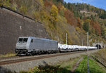 Das  Silberfischerl  LTE 185 621 war am 23.10.2016 mit fabriksneuen G-Klasse gen Norden unterwegs und wurde von mir bei der herbstlich verfärbten Ausfahrt aus dem 5460 m Galgenbergtunnel fotografiert.