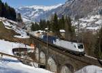 ES 64 U2 101 + 183 500 mit G 48888 am 02.03.2013 am Pyrkershhe-Viadukt bei Bad Hofgastein.