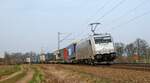 TX Logistik Austria 185 417 mit KLV-Zug in Richtung Osnabrück (Vehrte, 30.03.2014).