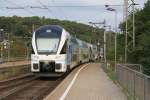 WSTBA 93 85 4010 001-4 als letztes Fahrzeug fhrt am 25.August 2012 aus dem Bf. Htteldorf.