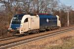 183 704 der Wiener Lokalbahnen Cargo GmbH fhrt als Lz Richtung Westen. Die Aufnahme entstand am 17.03.2012 bei Unter Oberndorf.