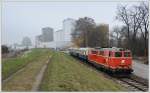 2143.21 der Wiener Lokalbahnen AG, am Karsamstag des Jahres 2013 fr eine Fotofahrt mit BB Pflatsch versehen, aufgenommen im Alberner Hafen in der Wiener Freudenau am 30.3.2013.