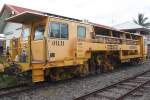 SRT อน.11 (อน.=TM./Tamping Machine) eine Gleisstopfmaschine der Type 09-16.CAT am 11.Juni 2011 in der Pak Chong Station.