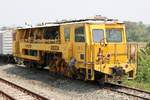SRT อน.8 (อน.=TM./Tamping Machine) eine Gleisstopfmaschine (Hersteller: Plasser & Theurer, Type 09-16 CAT, Baujahr: 1991, Fab.Nr.: 2.634) am 26.März 2023 in der Ban Dan Station.