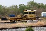 SRT รบน.033, ein Oberbauwagen (Fairmont Tamper, Baujahr 1992-99) am 18.April 2026 in der Lam Narai Station.