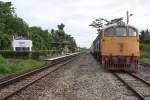 GEK 4040 (Co'Co', de, General Electric, Bj.1963, Fab.Nr. 34889) mit dem ORD 445 (Chumphon-Hat Yai Jc.) wartet am 19.Mai 2013 im Bf. Thung Kha die Kreuzung mit dem ORD 254 (Lang Suan-Thin Buri) ab.