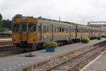 THN 1140 (1A' 2', dh, Nippon Sharyo, Bj.1983) verlsst am 23.August 2010 als ORD 304 (Lop Buri - Bangkok) den Bf.