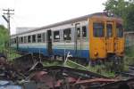 พซข.45 (พซข. = BTD/Bogie Trailer Diesel Railcar With Driving Cab, Hitachi/Nippon Sharyo, Bauj. 1971) am 13.Juni 2011 im Depot Nakhon Ratchasima. 

