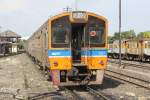 NKF 1217 als letztes Fahrzeug des EXP 71 von Bangkok nach Si Sa Ket fhrt am 17.Mai 2012 aus dem Bf. Nakhon Ratchasima in Richtung Thanon Chira Junction.