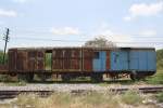 Keine LEIG-Einheit sondern bloss 2 ausgemusterte, kupplungslose ตญ.  (ตญ.=C.G./Covered Goods Wagon) standen  am 13.Mai 2012 auf dem Gelände des Phahon Yothin Yard. 

