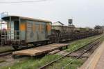 พ.ห.15123 (พ.ห.=B.V./Brake Van) am 10.Jänner 2011 am Schluß eines Schotterzuges im Bf. Nakhon Lampang.