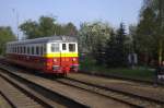  Ein TW der Baureihe M262 bei der Zugkreuzung in Praha Cakovice   25.04.2015  08:28 Uhr.