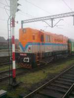 Tschechische T448p-122 (eigentlich bereits seit 1988 Baureihe 740) der Tschechischen Eisenbahn vor einem Bauzug mit österreichischen Waggongs am 15. Januar 2014 im Bahnhof von Kandrzin-Cosel (Kedzierzyn-Kozle) im polnischen Teil Oberschlesiens.