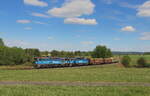 Die 750 326 und 750 252 der CD Cargo holten am 10.Mai 2024 aus Nove mesto pod Smrkem mehrere Hölzer beladene Waggons und fuhren sie nach Frydlant. Dabei konnte nach der Ausfahrt in Rasnice der Zug als Mn 84001 fotografiert werden.