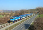 754 062 passes Harvice whilst working train 883, 0545 Hradec Kralove - Luhacovice, 31 March 2019