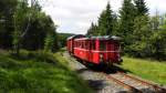 12.07.2014 CD Triebwagen M 131.1513 mit gedecktem Güterwagen auf Sonderfahrt zwischen Chomutov und Vejperty. Hier bei Kovarska.