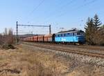 123 009-3 mit einem Kohlenzug zu sehen am 20.03.22 in Želenice nad Bílinou.