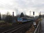 362 126 zusehen mit einem Schnellzug am 06.01.14 in Citice. Er kam von Cheb und fährt nach Prag.