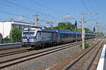 384 014 rollte mit dem RJ 173 nach Prag am 02.07.26 durch Falkensee Richtung Berlin.