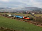 Die 242 277 mit einem Os nach Klatovy am 03.01.2014 unterwegs bei Vícenice.