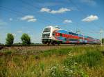 471 032 fhrt einen Personenzug von Pardubice nach Praha.