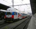 471 011-7 steht als S2 nach Kolin in Praha Masarykovo nádra¸í bereit am 22.12.2012.