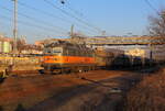 PKP Cargo 130 049 mit Leerkohlezug in Usti nad Labem zapat mit Abendlich am 13.02.2022 eingefangen. 