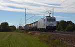 386 005 schleppte am 29.09.16 einen langen Containerzug durch Gräfenhainichen Richtung Wittenberg.