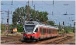 5341 017-1 nach Budapest Nyugati verlsst Vc. Im Hintergrund hat 628 333 Wochenendruhe. (12.05.2013)