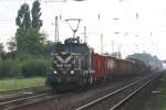 MAV Elektrolok V 46058 erreicht hier am 29.8.2005 mit einem gemischten Güterzug aus Richtung Budapest kommend und in Richtung Miskolc fahrend den Bahnhof Mezökövesd.