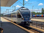 H-START 415 052 steht mit einem Regionalzug nach Budapest Deli in Budapest Kelenf�ld, 19.06.2026.