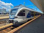 H-START 415 052 steht mit einem Regionalzug nach Budapest Deli in Budapest Kelenf�ld, 19.06.2026.