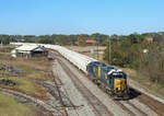 2339 & 6455 cross the interlocking at Waycross with a train of hopper wagons, 24 Nov 2017.