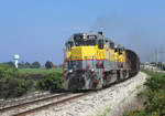 506 passes Pahokee whilst working BT4, loaded sugarcane from Bryant to Clewiston, 4 March 2019.

Also in the consist is 501, this is being hauled dead back to Clewiston for maintenece after being outbased at Bryant for several days