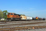 6987 waits to depart Beaumont Yard whilst on the right KCS's 3912 is tied down, 22 March 2018